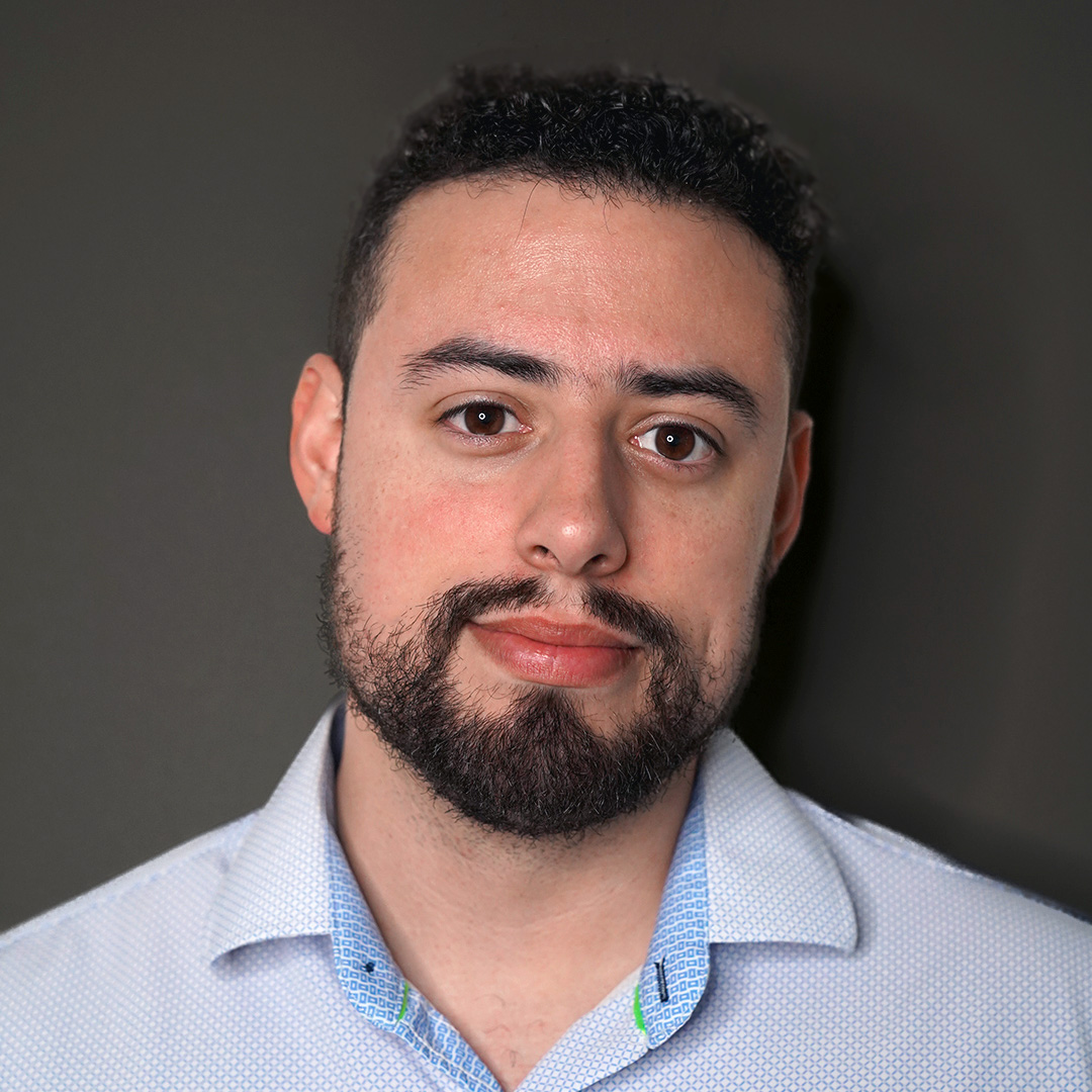 Loren Haskins Project Manager Urban Planner Headshot Dark Background
