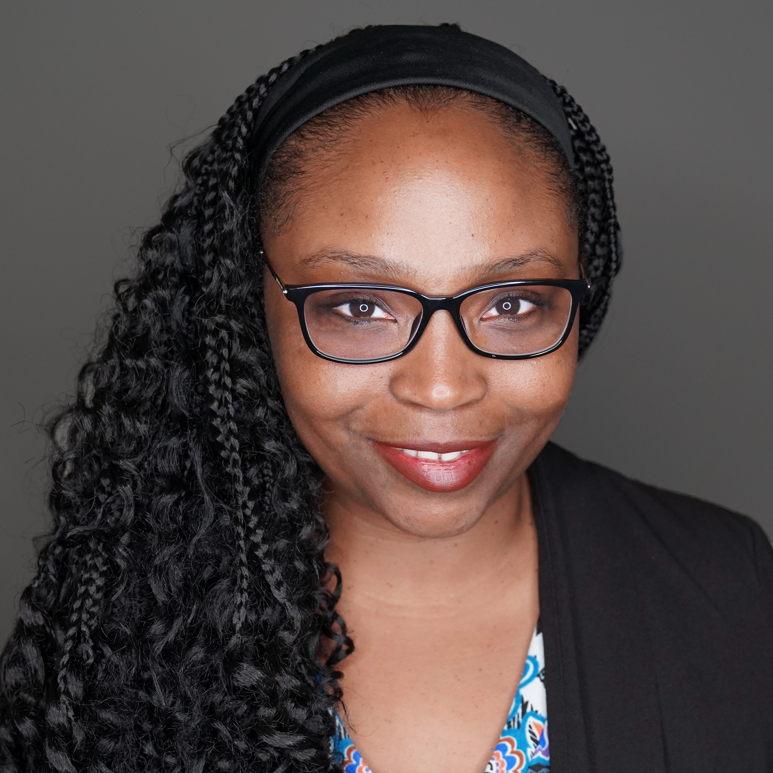 Sammone Dixon Administrative Manager Headshot Dark Background