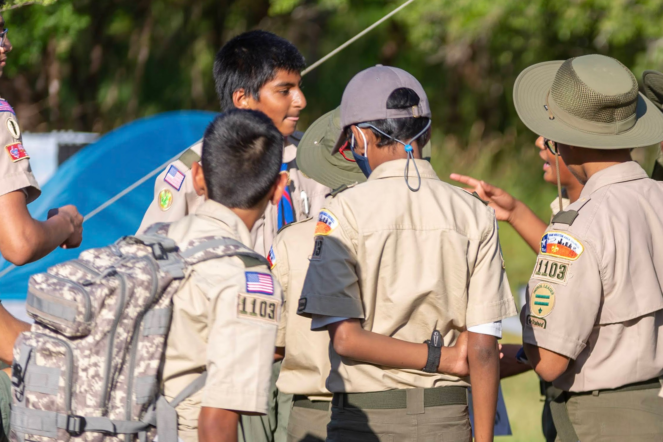 Boy Scouts huddling