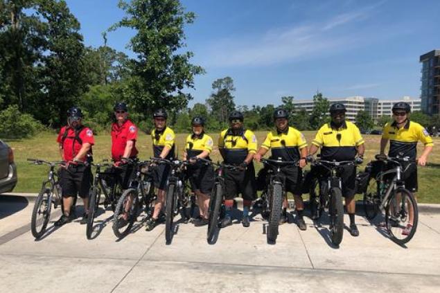 Fort Bend EMS Bike Team in yellow shirts