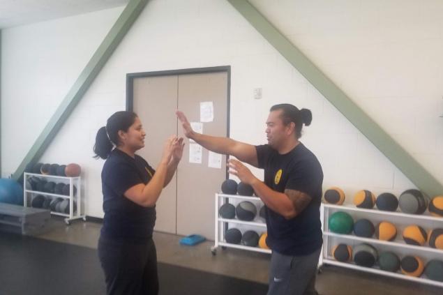 Employees training in self-defense